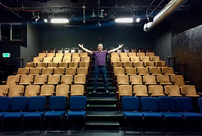 David Rodwin in a theatre